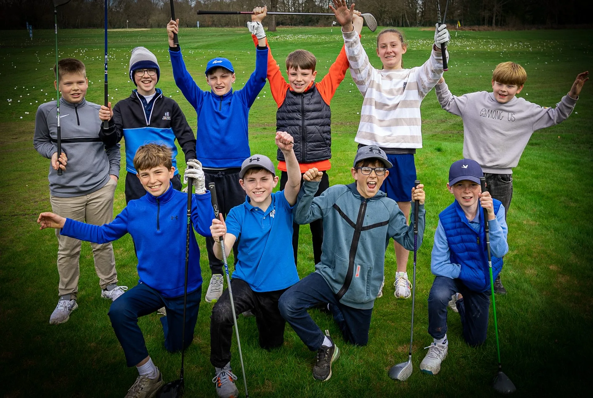 group of kids celebrating after junior golf lesson in bristol