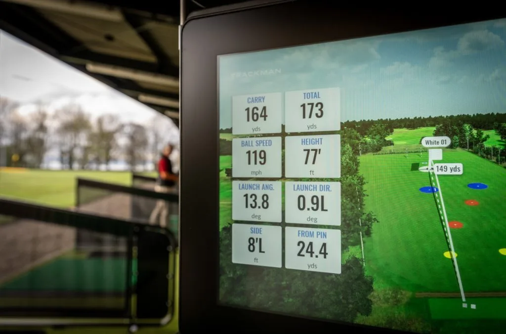 trackman launch monitor displaying stats from previous shot at driving range in bristol