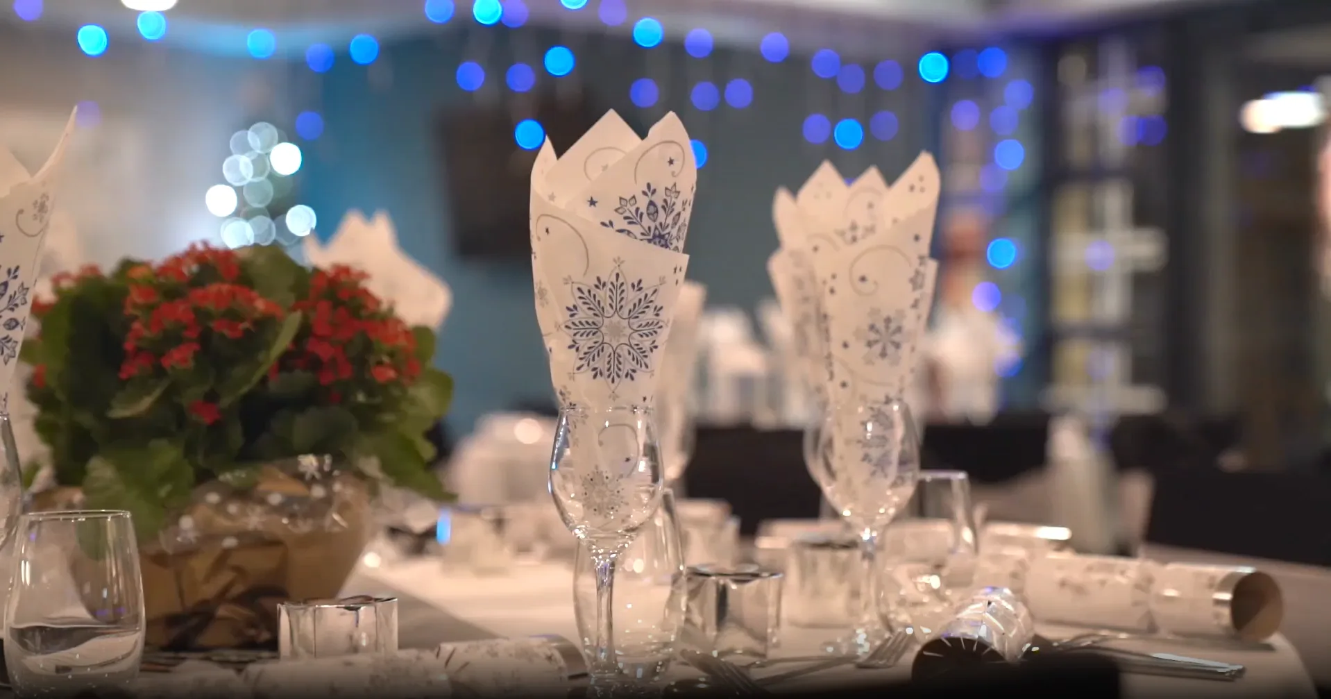 decorated table with snowflake tissue at a christmas party in bristol